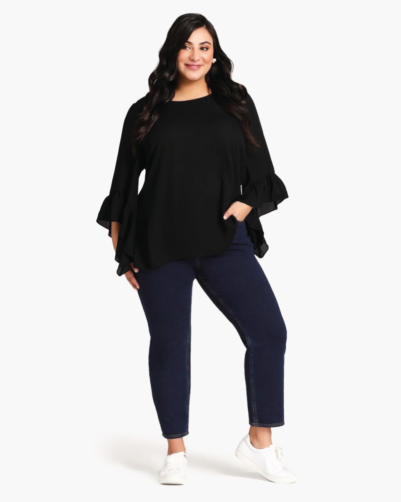 Plus size model wearing Slim Stretch Pull-On Jean by Avenue | Dia&Co | dia_product_style_image_id:171759